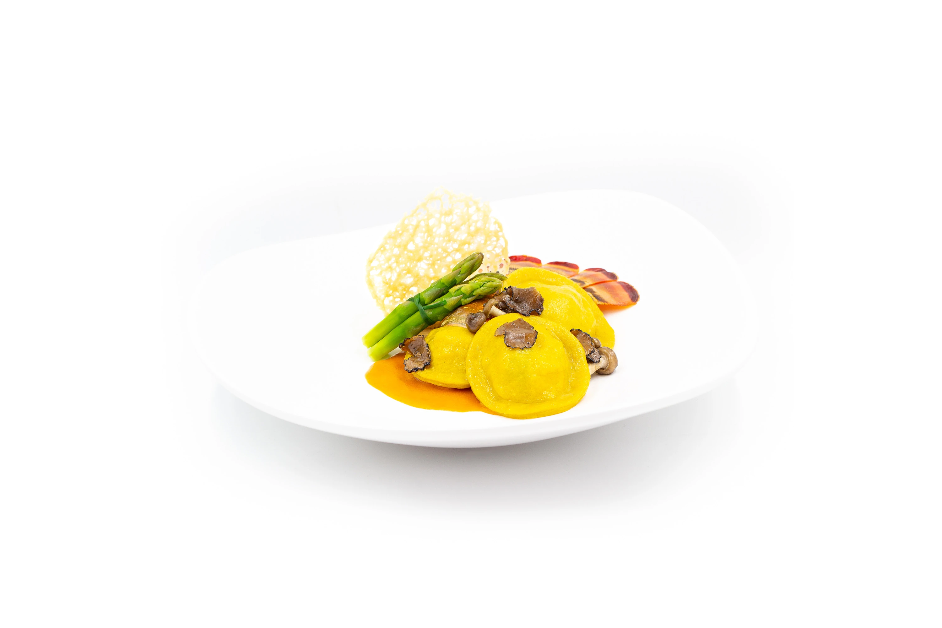 Lobster, crab and king prawn ravioli, lobster bisque, asparagus and truffle.