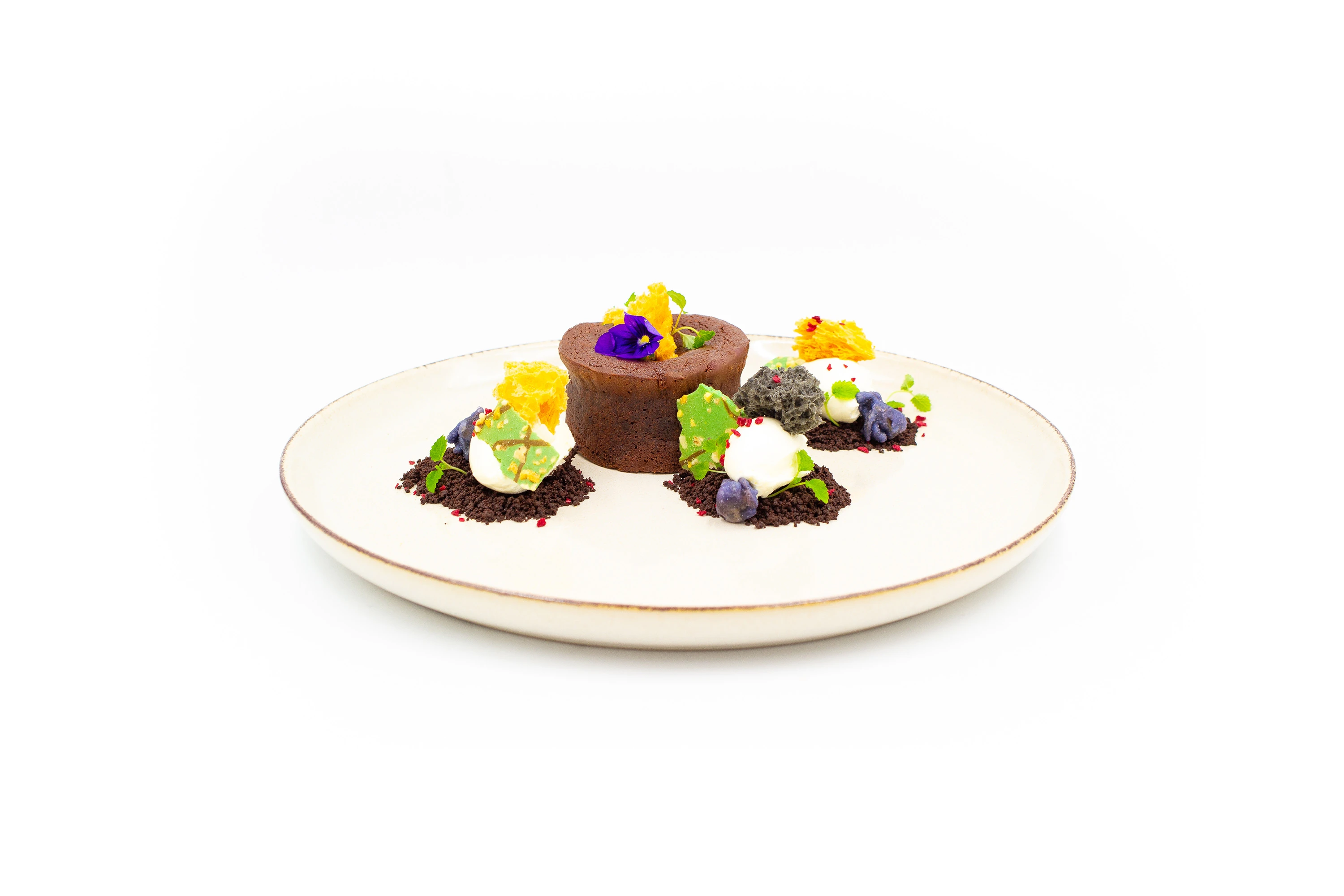 Warm dark chocolate fondant and assorted sweet garnishes.