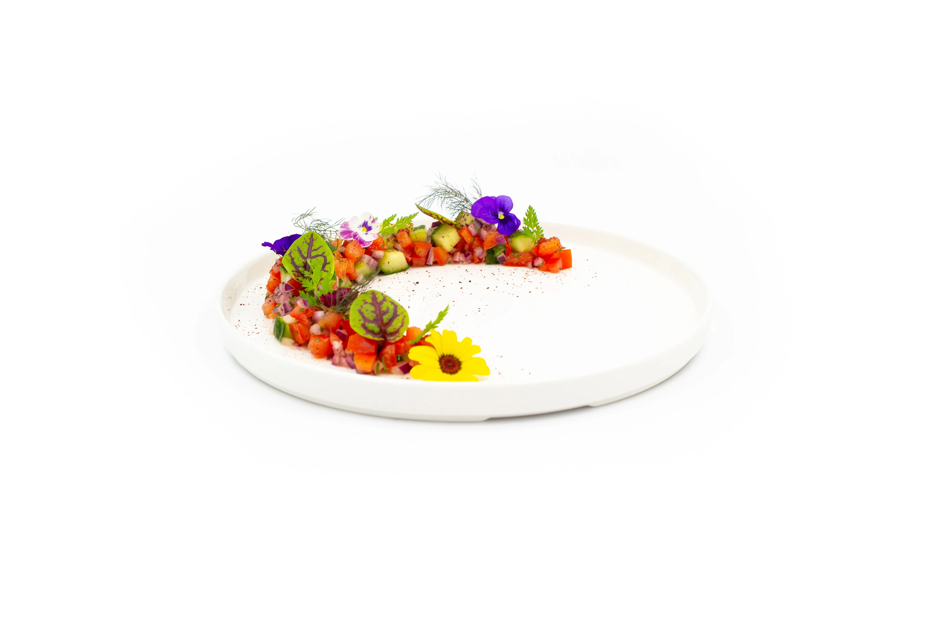 Tomatoes, cucumber, baby radish, fresh herbs and sumac.