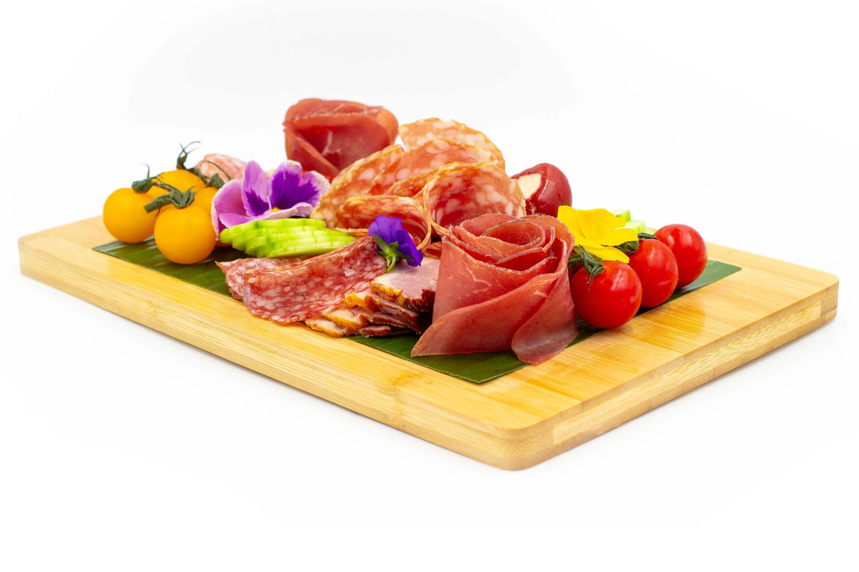 Charcuterie platter with british and continental cured meats and pickles.